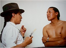 Dr. Incayawar examining a patient in Otavalo, Ecuador